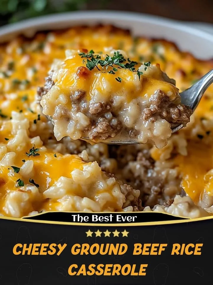 Cheesy ground beef rice casserole served in a baking dish with melted cheese on top.