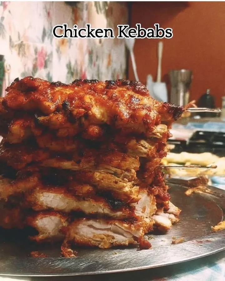 Grilled Chicken Kebabs skewered with vegetables, ready to serve.