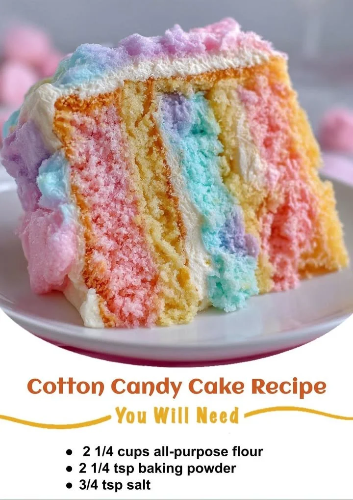 Delicious Cotton Candy Cake topped with fluffy cotton candy and colorful sprinkles