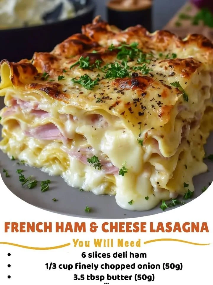 Delicious Ham & Cheese Lasagna topped with creamy Mornay sauce, served hot.