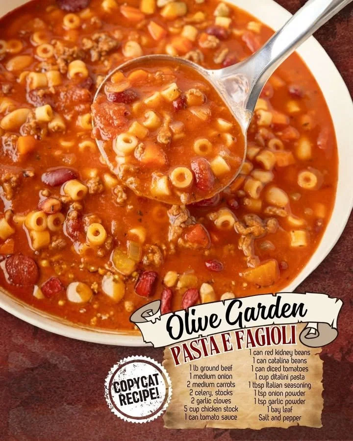 Bowl of Olive Garden Pasta and Beans with fresh herbs and beans