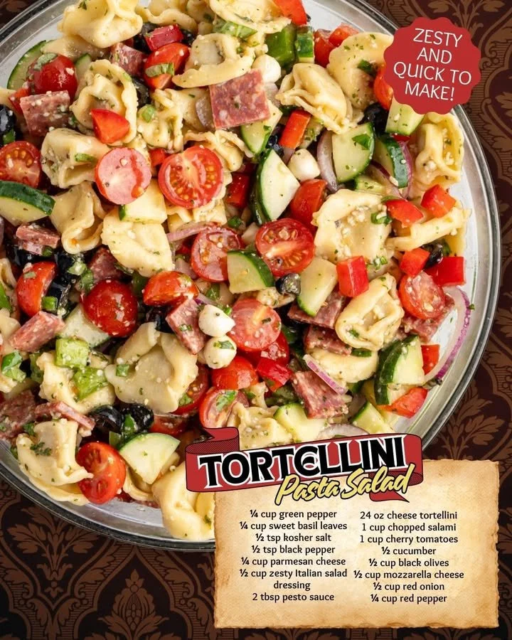 Colorful Tortellini Pasta Salad with vegetables and dressing in a serving bowl